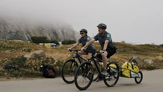 2 san luis ambulance employees on bicycles