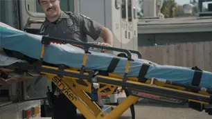San luis ambulance medical personnel loading a stretcher in ambulance